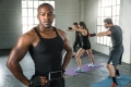 African american black male athlete trainer in workout gym for b